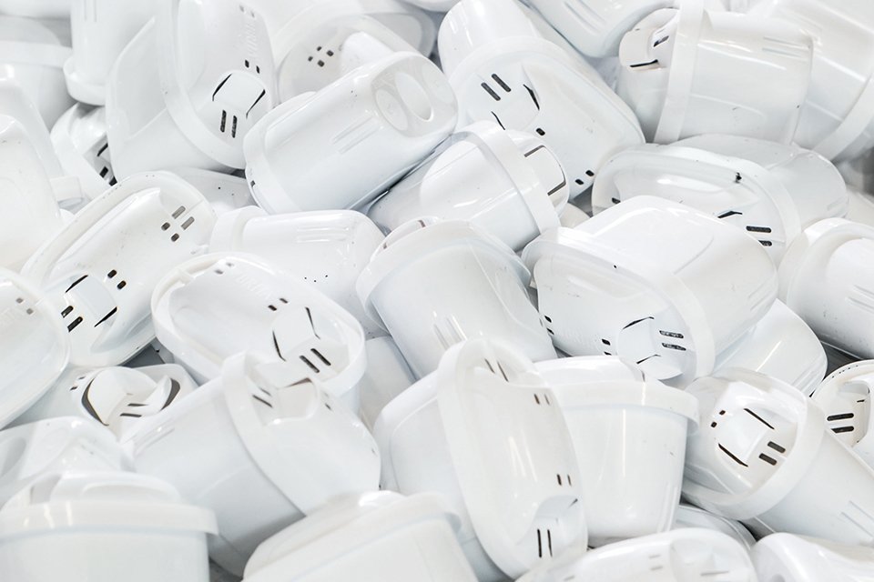 A heap of used BRITA water filter cartridges.