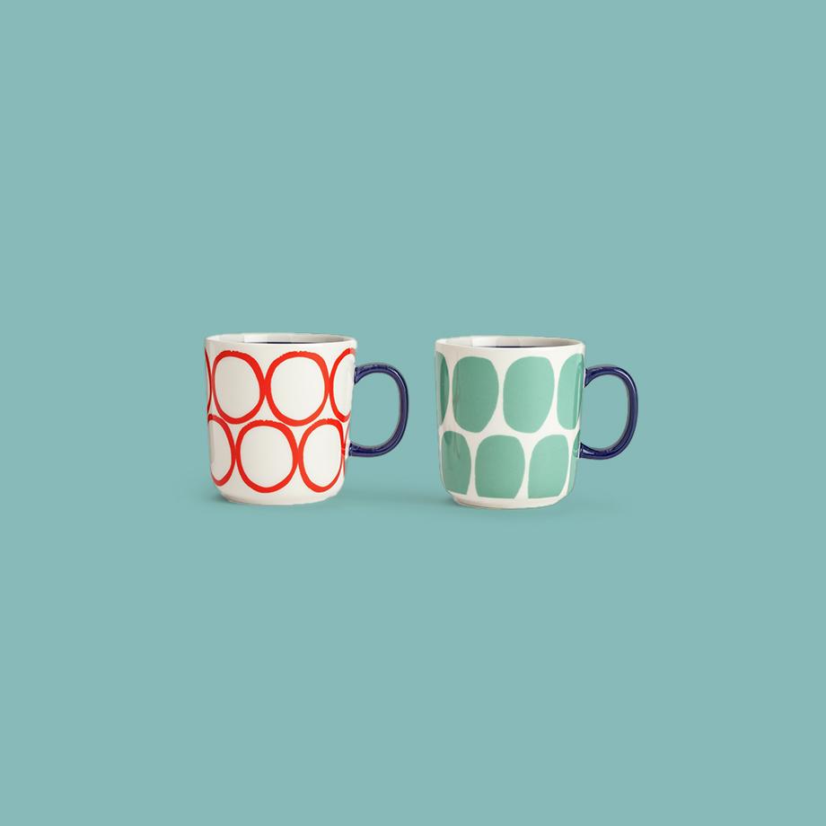 Pair of patterened mugs in red and teal.