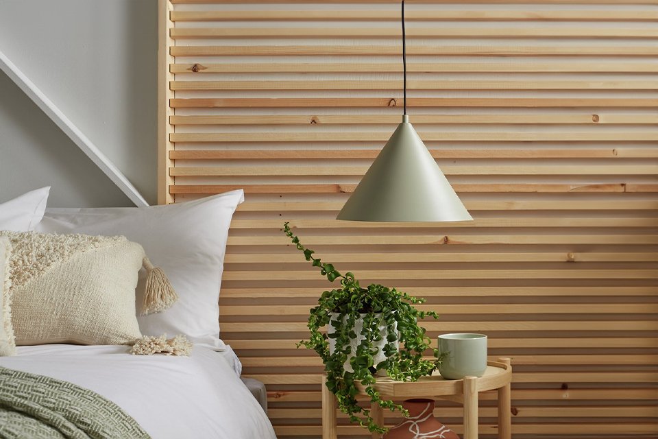 Hanging green bedroom light from ceiling.