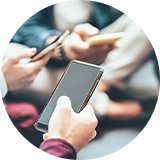 An image of a group of people using smart phones. 