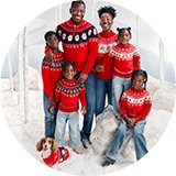 Matching Christmas jumpers.