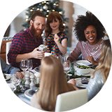 Friends and family dining together at a housewarming party.