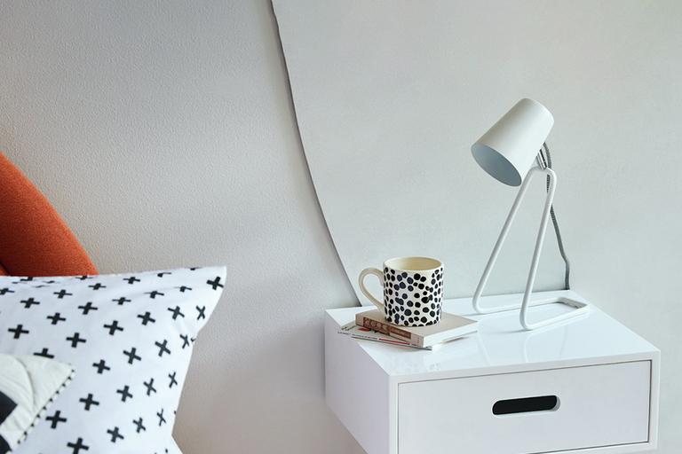 Image of white bedside table lamp.