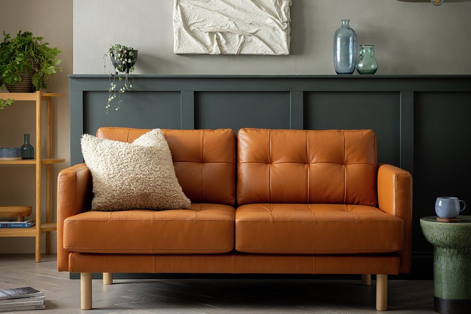 A Habitat leather 2-seater sofa in tan.