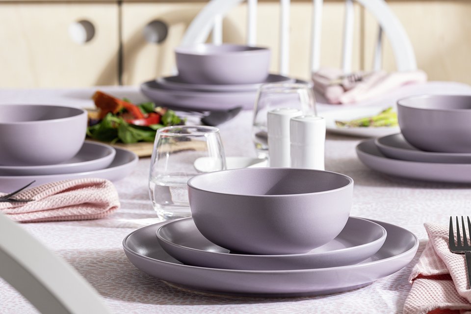 A Habitat matte glaze 12-piece stoneware dinner set in lilac colour.