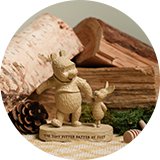 A Disney Winnie the Pooh figurine.