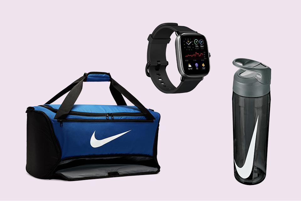 Fitness watch, water bottle and a sports holdall bag.
