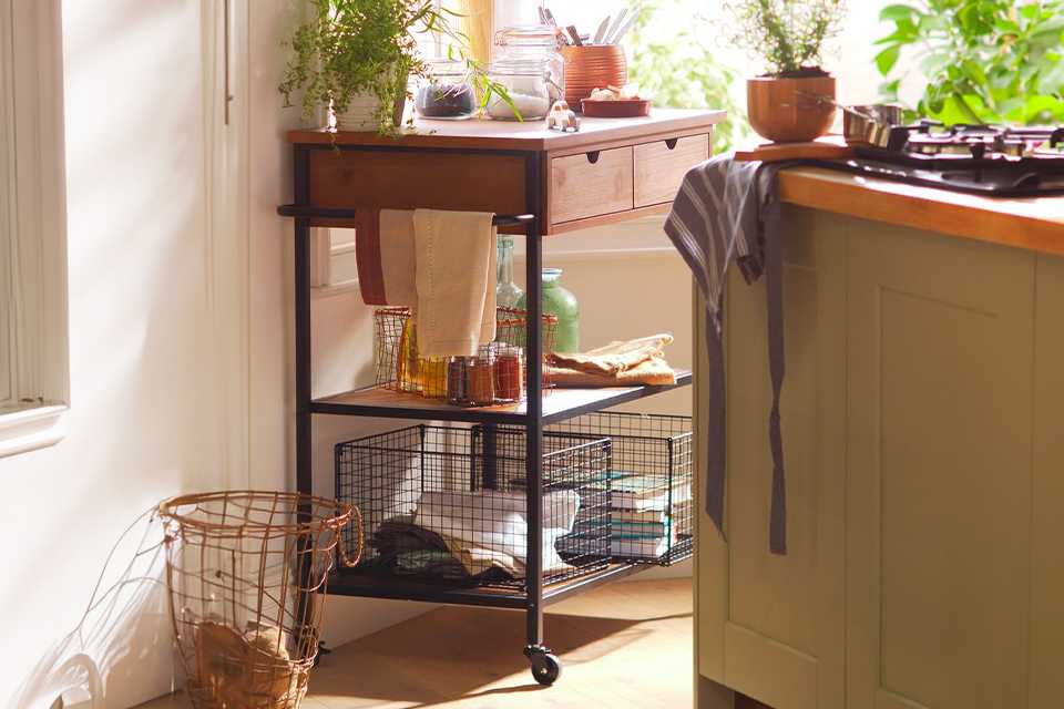 Metal and wood kitchen trolley with two drawers.