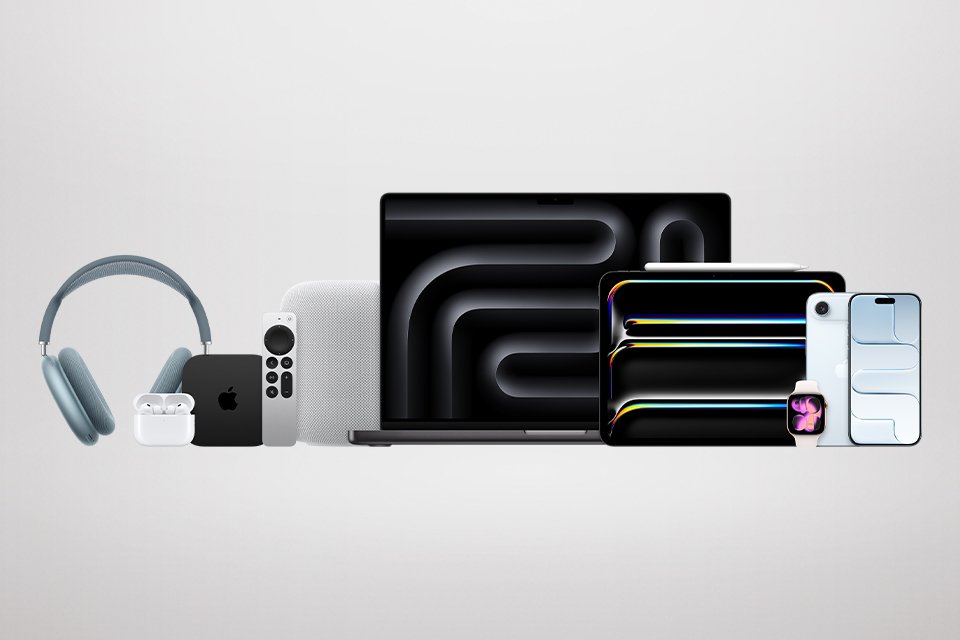 A selection of Apple devices aligned next to eahc other, including: Apple TV, Apple HomePod, Apple MacBook Pro, Apple iPad Pro, Apple AirPods Pro, Apple Watch Series 8, Apple iPhone 14 Pro, and Apple iPhone 14 Pro Max.