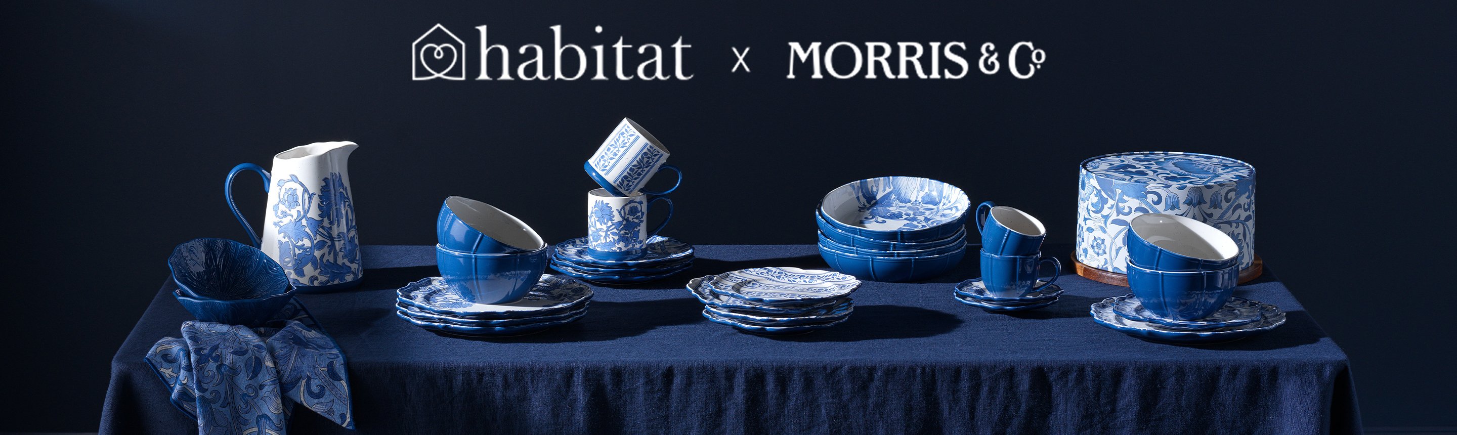 A banner for the Habitat x Morris and Co. collaboration with blue patterned plates, bowls and cups.