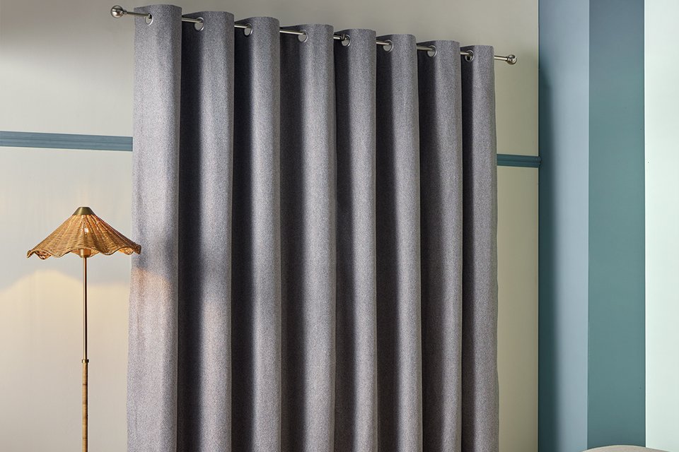 Habitat Textured Blackout Herringbone Eyelet Curtain in dark grey colour.