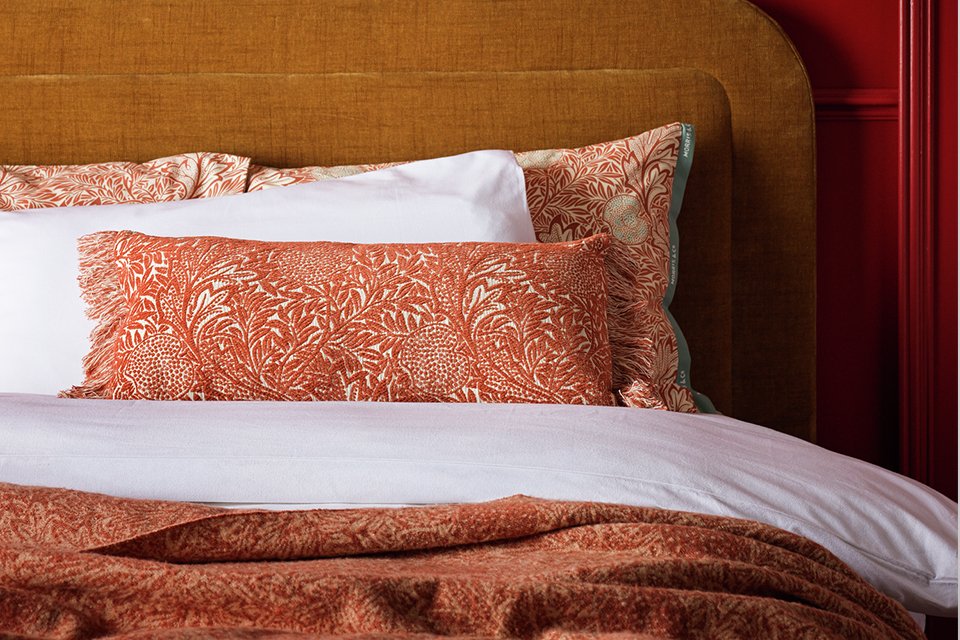 Morris and co artichoke bolster cushion.