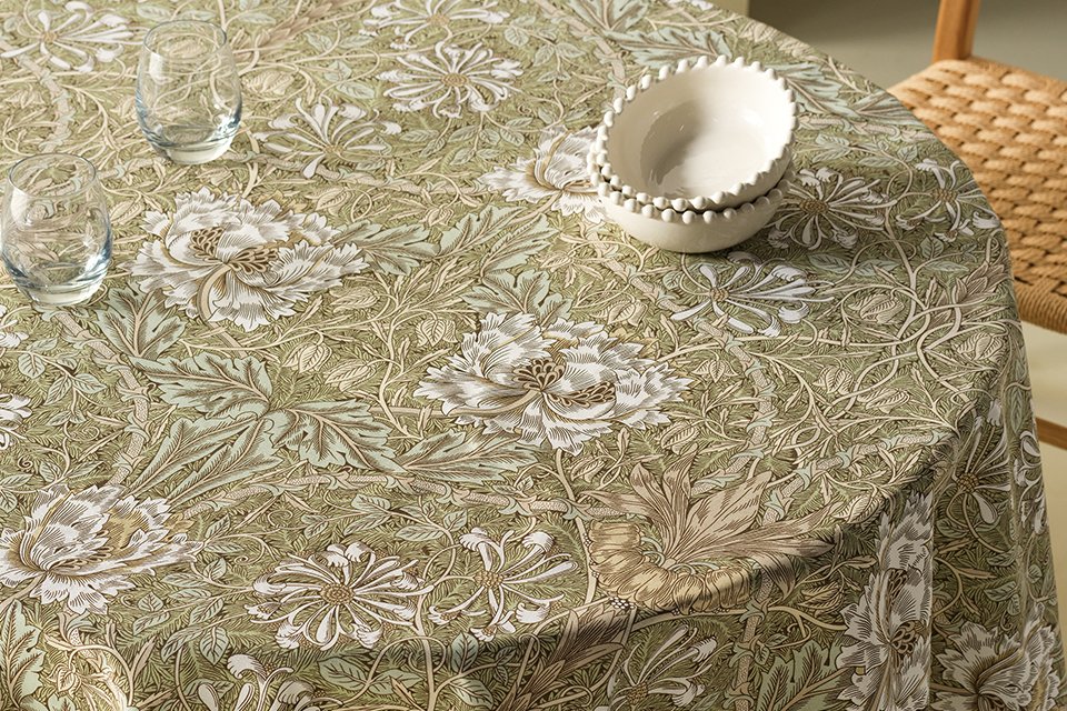 Green william and morris round tablecloth in leaf pattern.