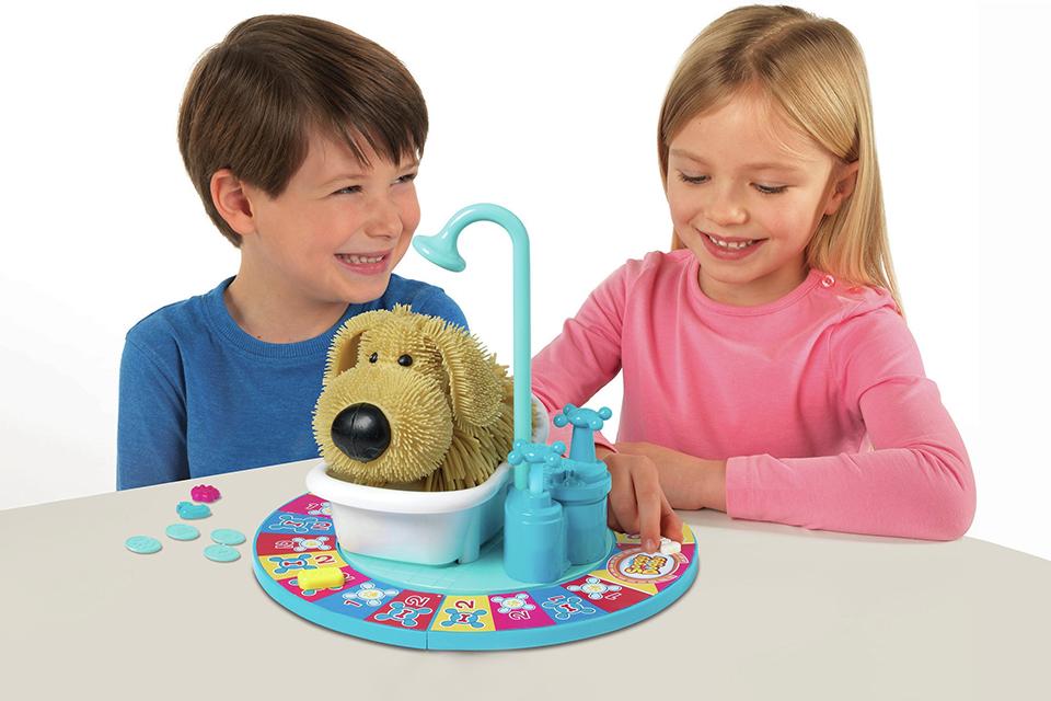 Two children playing the Ideal Soggy Doggy Game together.