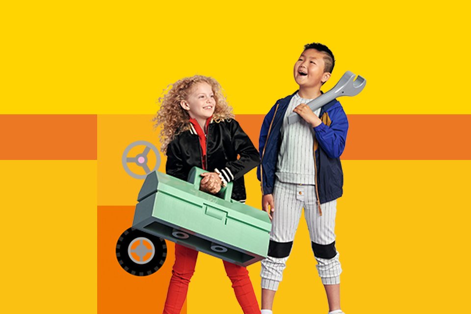 A boy and a girl holding car tools against yellow background.