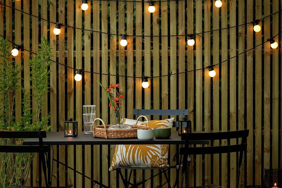 Outdoor lighting. There is nothing more inviting than a well-lit outdoors in the evening.