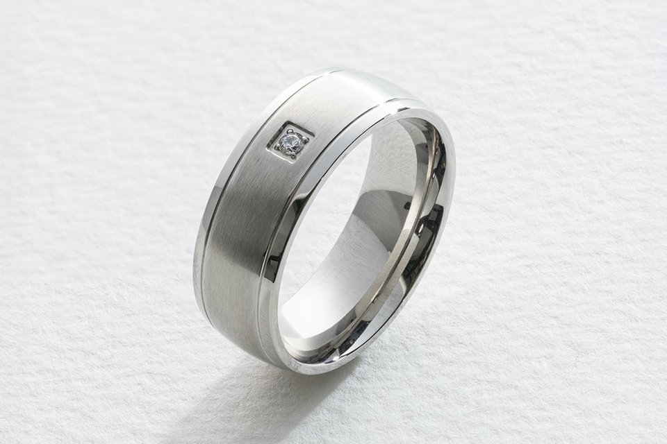 A Revere men's stainless steel cubic zirconia ring in size U.