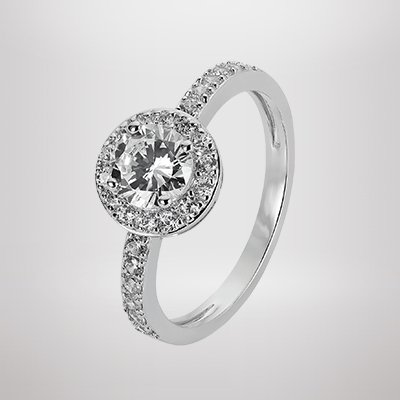 A Revere Sterling Silver Cubic Zirconia Halo Ring in size N.