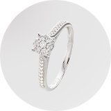 A Revere 9ct White Gold 0.20ct Diamond Engagement Ring in size J.