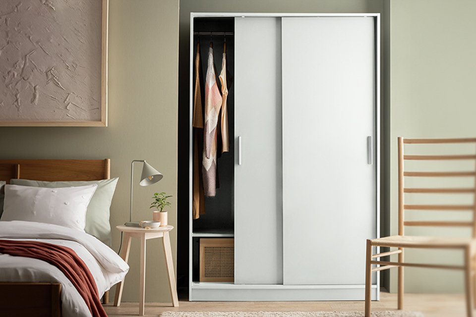 White bedroom furniture. Includes wardrobes, bedside tables and more.