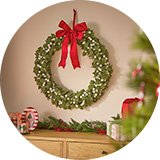 A Christmas wreath on a door.