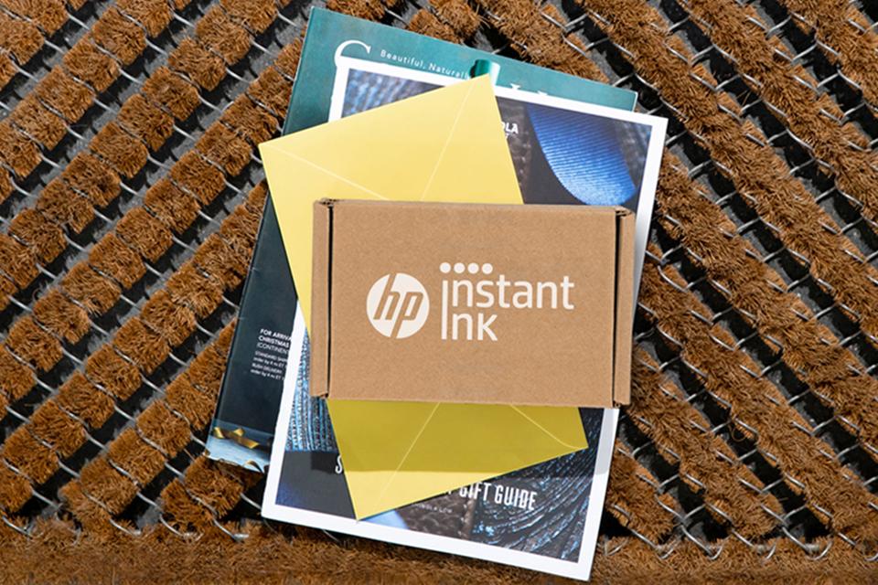 HP Instant ink box on top of printed images.