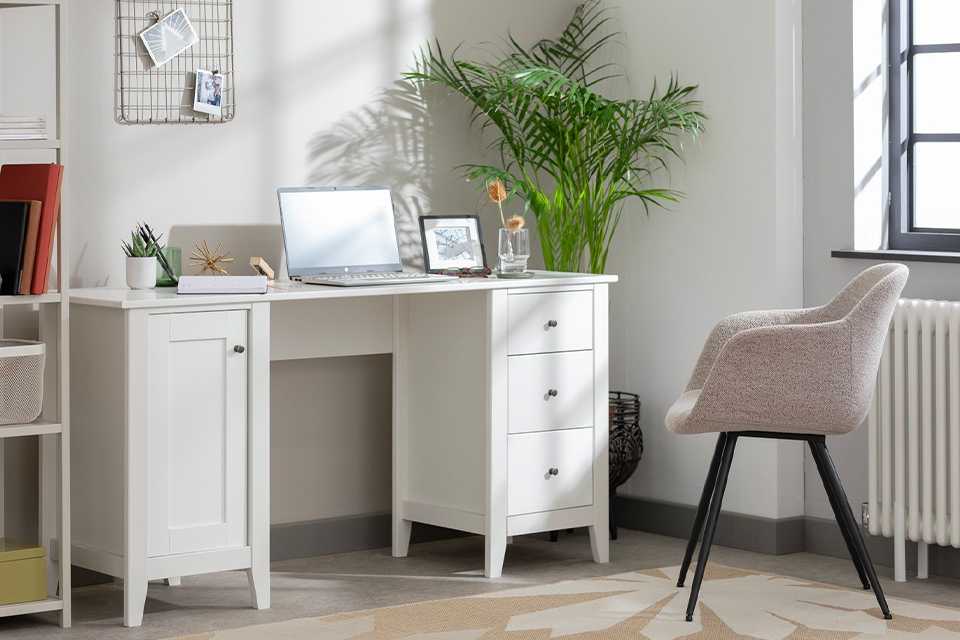 3 drawer office desk in white wood finish.