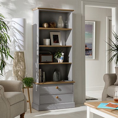 Grey bookaces in living rom.