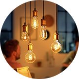 Light bulbs hanging in living room.