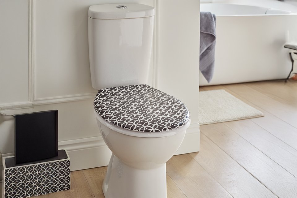 An Argos Home printed toilet seat in black and white.