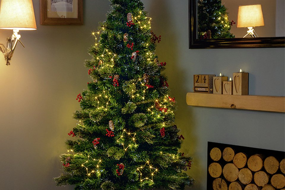A Premier Decorations 4ft pre-lit snow tip Christmas tree.