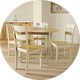 An Argos Home round dining set in a dining room.