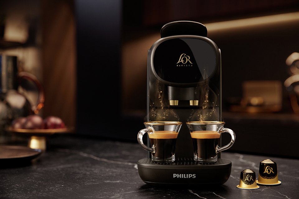 A Philips Sublime L'OR Nespresso pod coffee machine near coffee capsules.