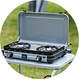 Camping stoves and cookers.