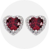 Heart-shaped diamond and stone-studded earrings.