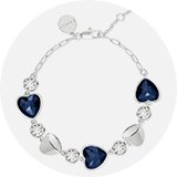 A silver bracelet with blue stones.