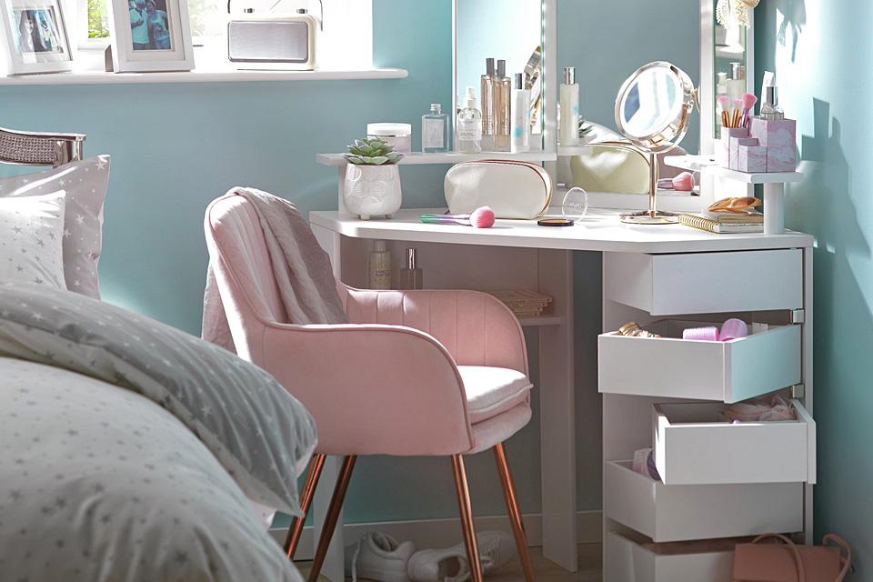 Image of a white corner dressing table with lots of storage.