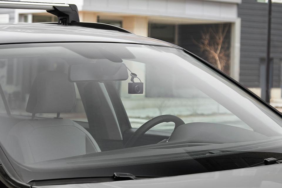 Image shows a Garmin dash cam set up in a car.