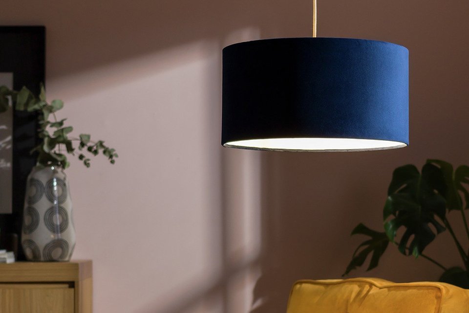 Fabric lamp shade hanging.