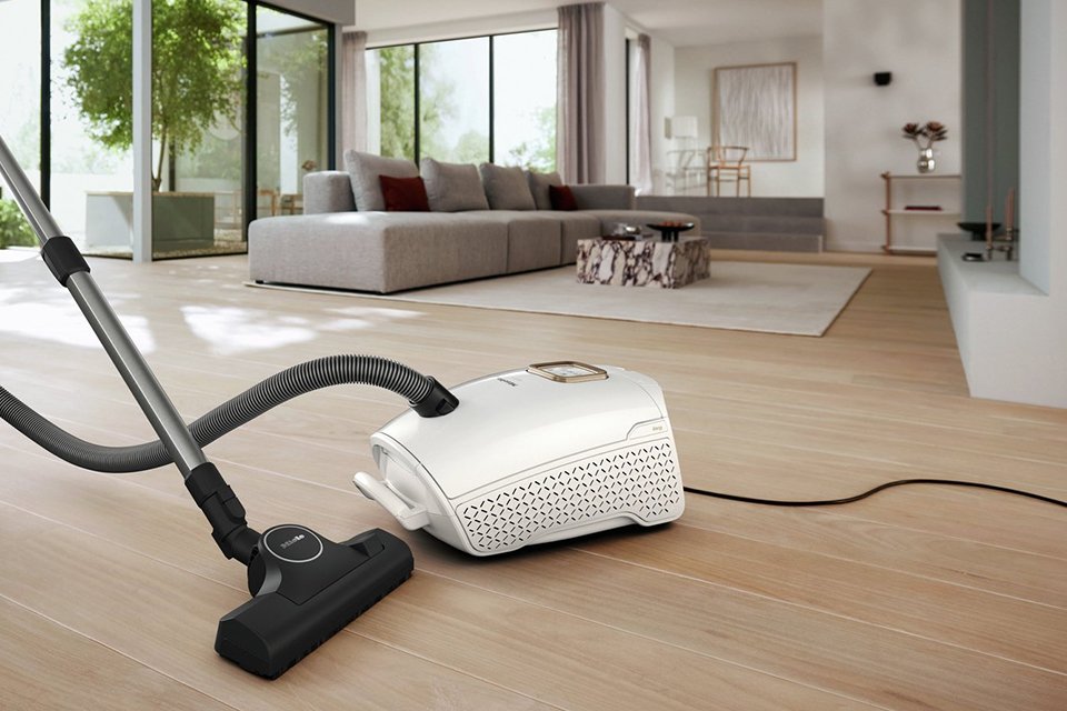 A Miele Guard L1 Allergy Bagged Cylinder Corded Vacuum Cleaner.