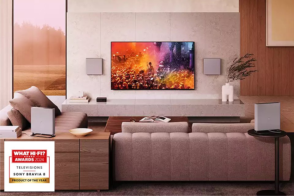 A living room with Sony BRAVIA 8 XR OLE TV placed in it with an award sticker on bottom left corner.