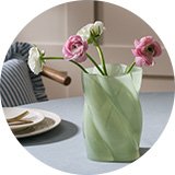 A pair of green and pink Habitat Twisted Glass Vase.