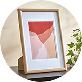 A Habitat Oak Effect 8x12" A4 Wooden Picture Frame.