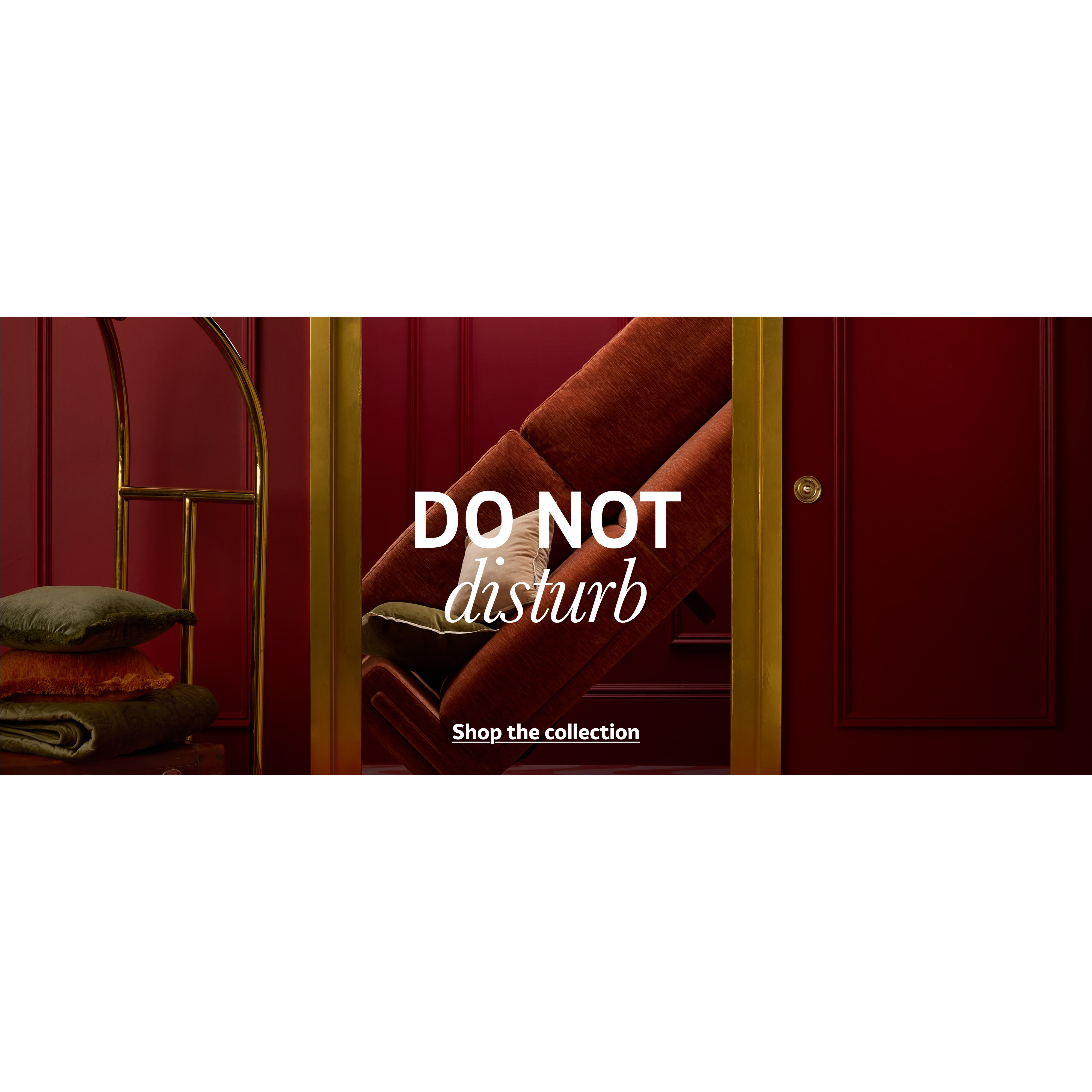 A banner displaying a hotel lift with a Habitat sofa and cushions inside with text saying do not disturb.