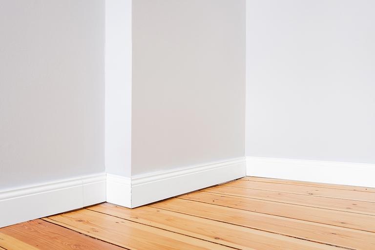 The skirting board in a room.