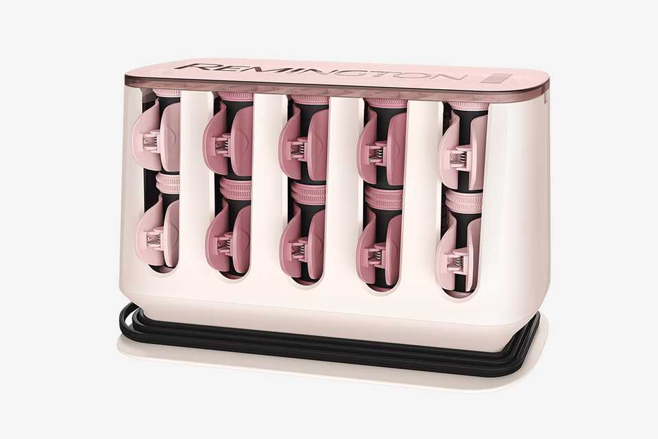 Light pink proluxe you hot rollers in their cream case on a white background.
