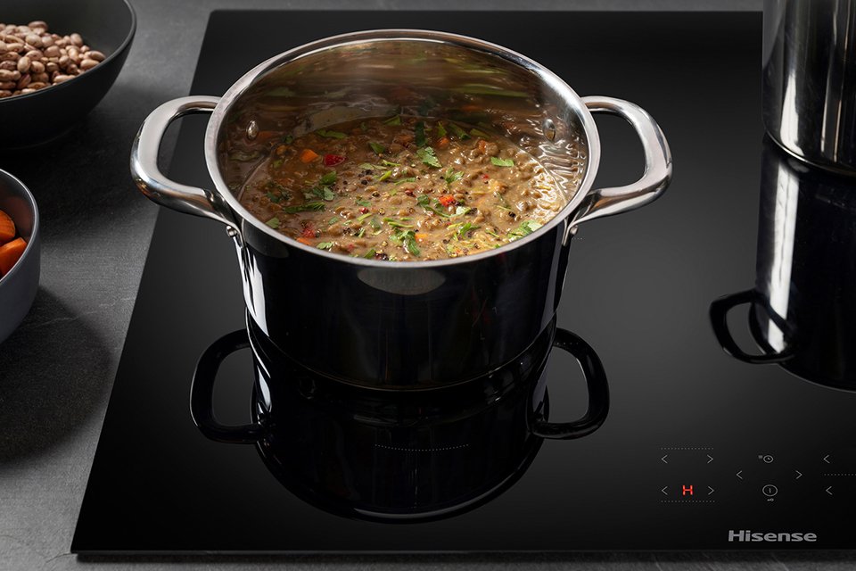 Overcooked food on a hob.