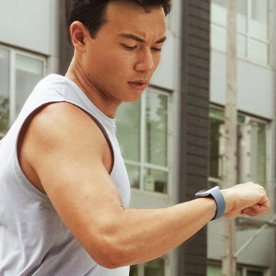 Fitbit Versa 4 Smart Watch in graphite.