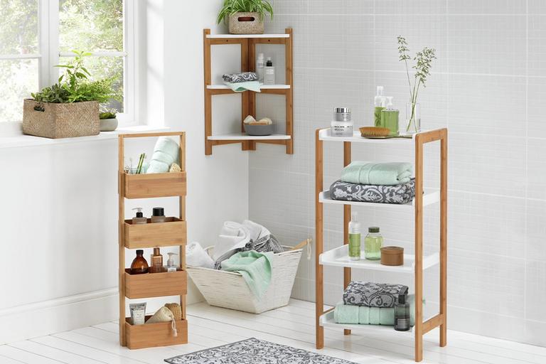 Wooden utility storage solutions featuring a laundry basket, a free-standing caddy and shelves.