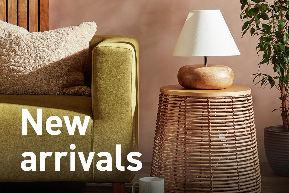 Bubble side lamp with whte lamp shade in living room.